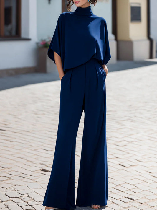 Blusa Drappeggiata Minimalista con Collo Alto e Set di Pantaloni a Gamba Larga