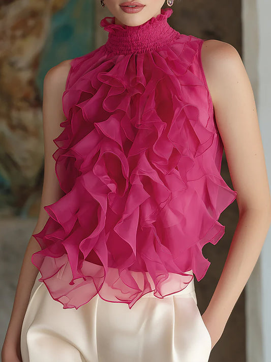 Blusa senza maniche in chiffon con collo alto arricciato