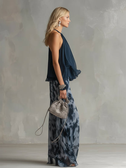 Lilla – conjunto elegante de gasa con una blusa de cuello alto y pantalones de pierna ancha con estampado