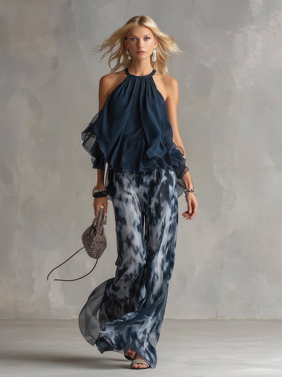 Lilla – conjunto elegante de gasa con una blusa de cuello alto y pantalones de pierna ancha con estampado