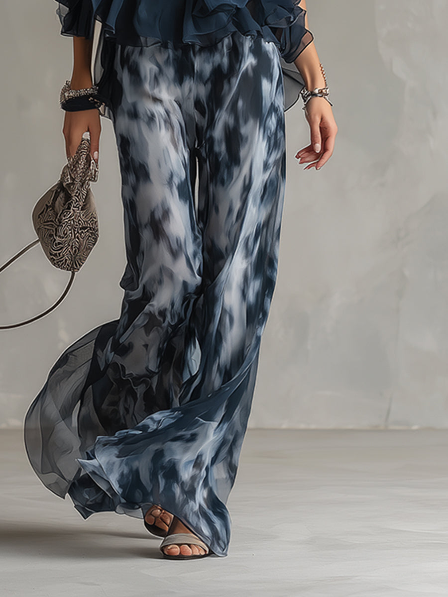 Lilla – conjunto elegante de gasa con una blusa de cuello alto y pantalones de pierna ancha con estampado