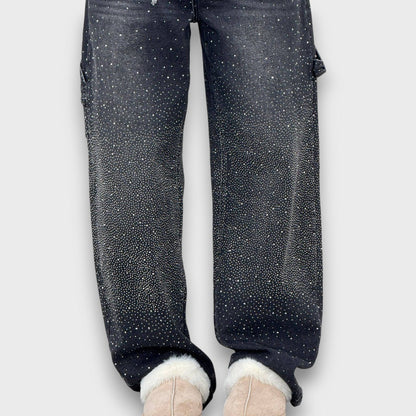 Nolene – Jeans con finitura lucida e carattere urbano