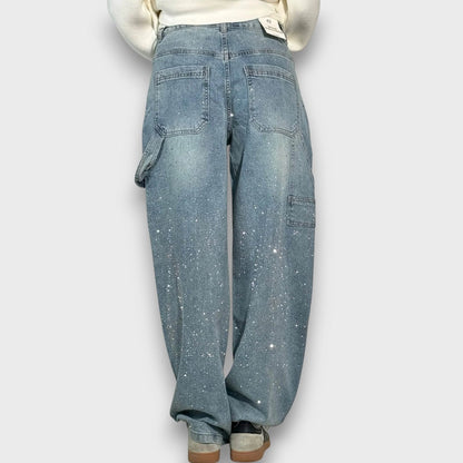 Nolene – Jeans con finitura lucida e carattere urbano